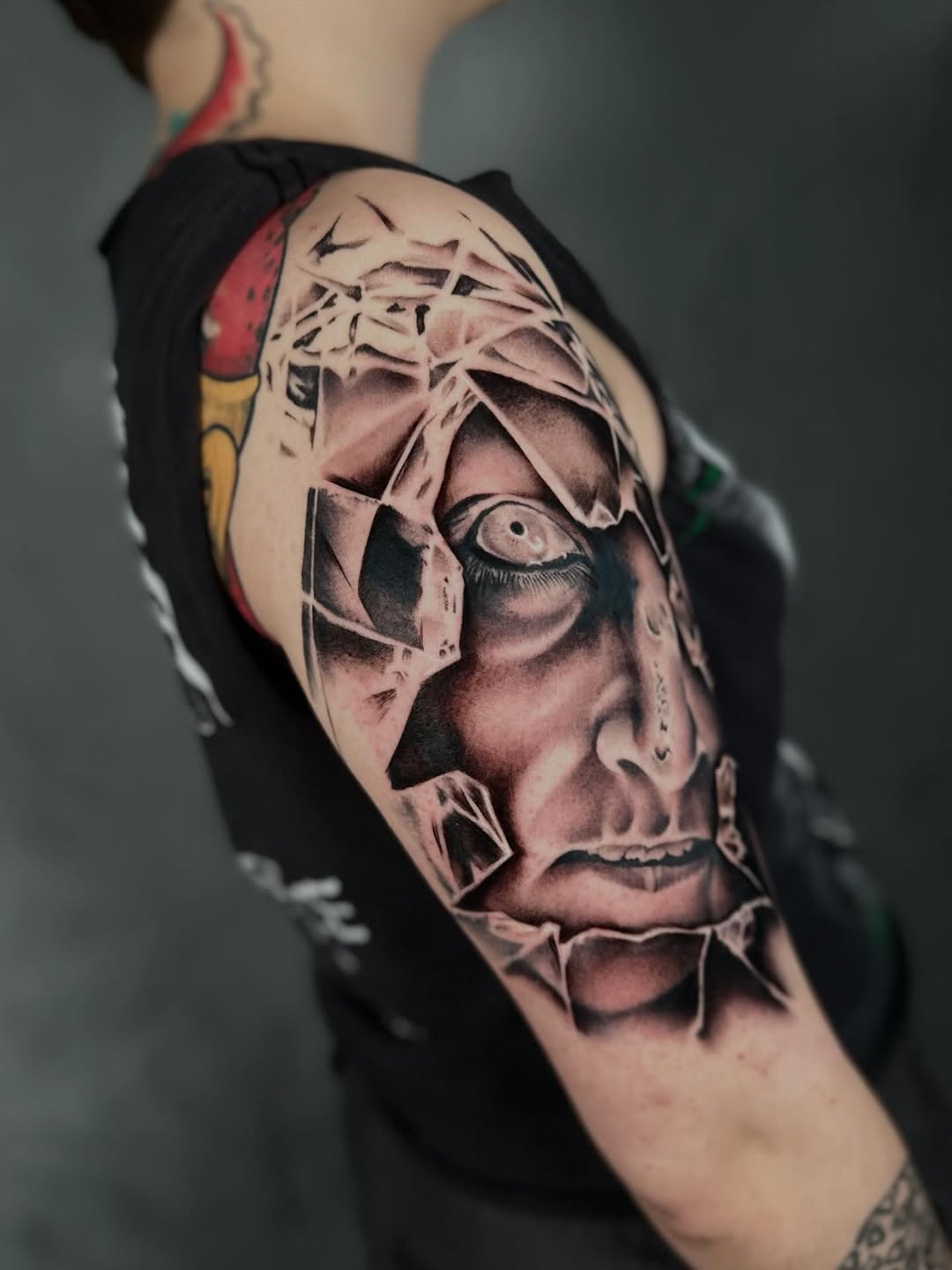 Tattoo by @dxmon.ttt โ realism, black_and_grey