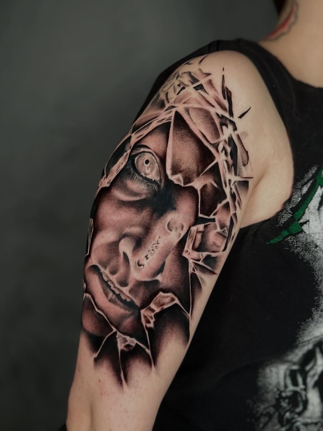 Tattoo by @dxmon.ttt โ realism, black_and_grey