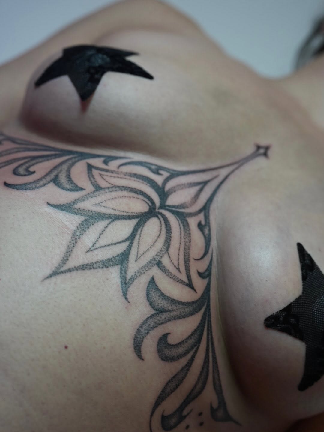 Tattoo by @voidlight.tattoo — dotwork, ornamental