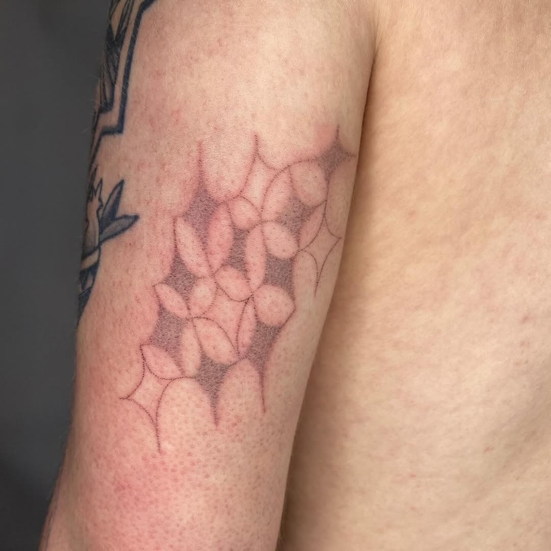 Tattoo by @hot_paws_pokes — geometric, dotwork