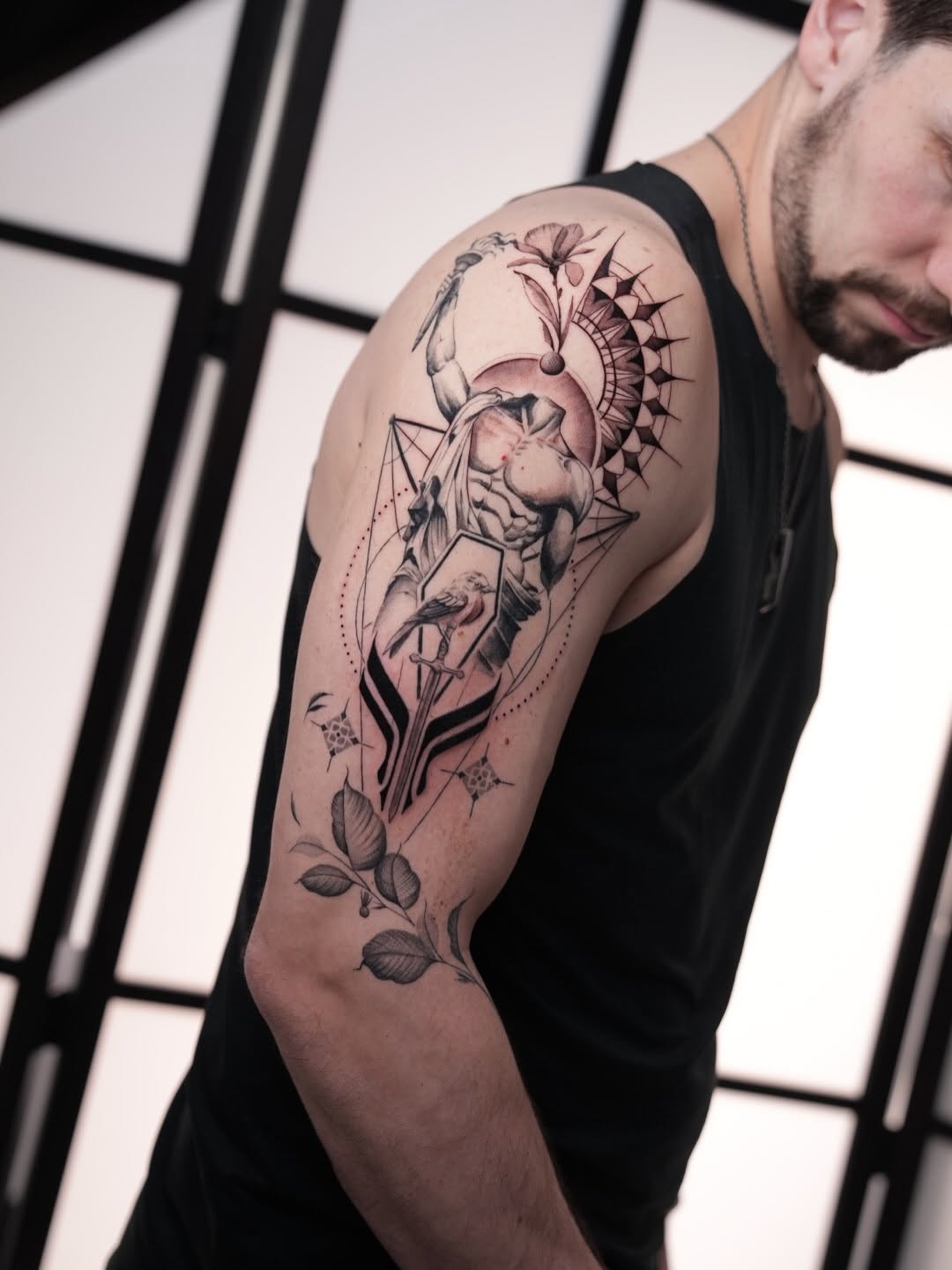 Tattoo by @d.vancasso.ink — black_and_grey, illustrative