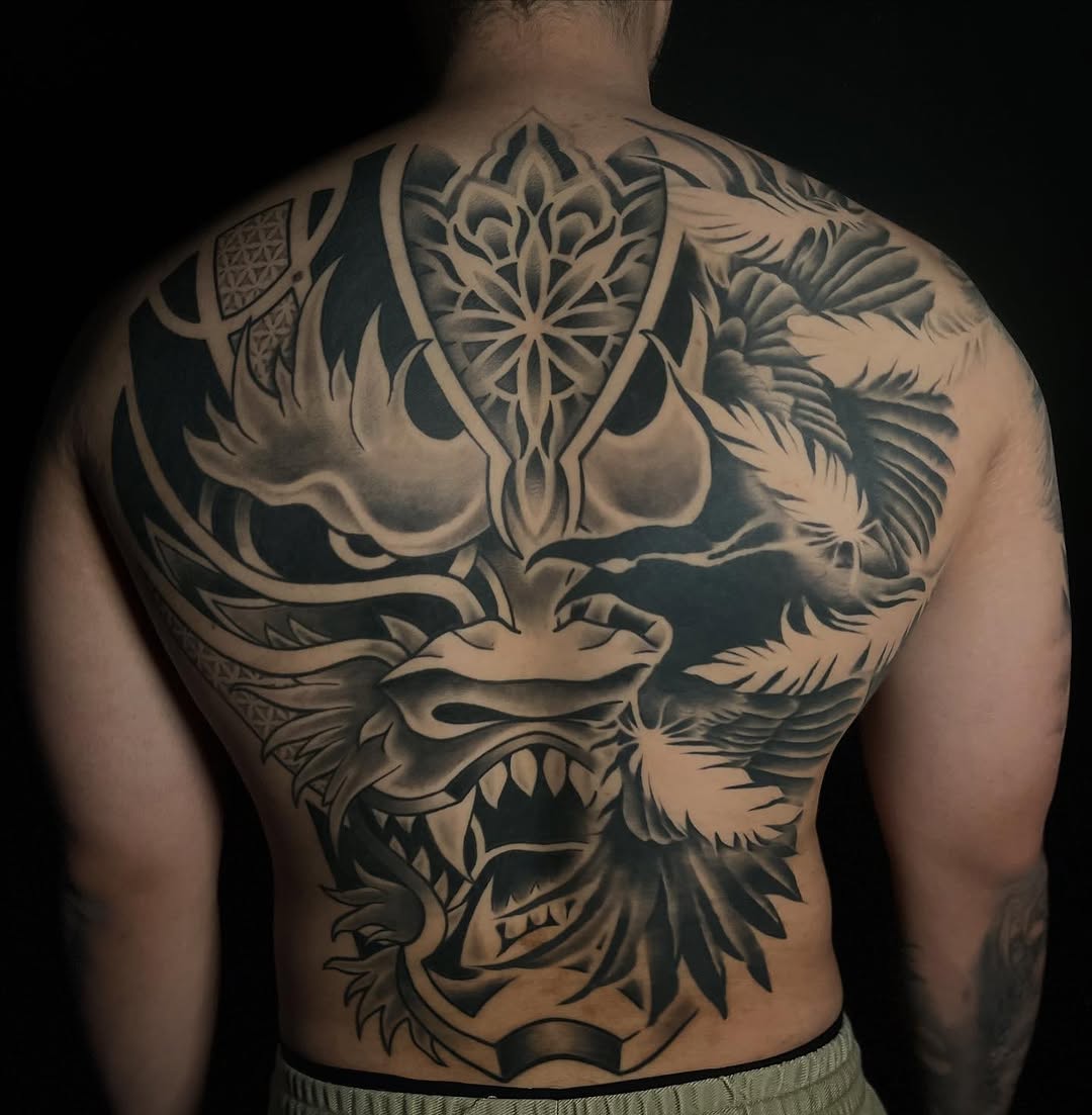 Tattoo by @lovebugtattoos โ japanese_irezumi, black_and_grey