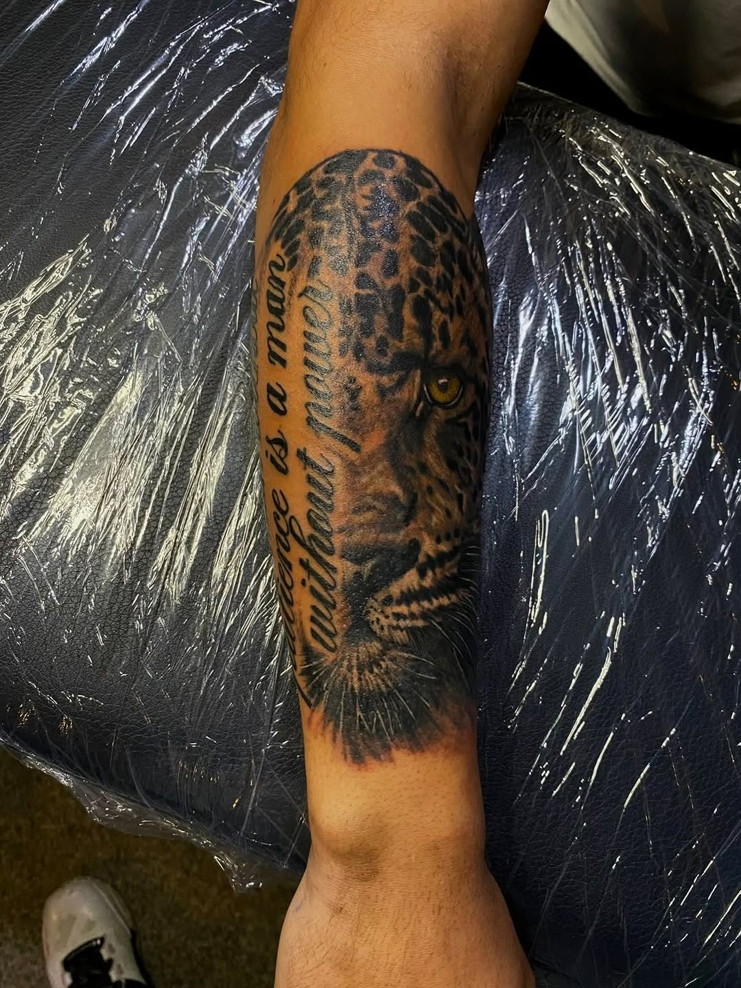 Tattoo by @prettyboyblueink — realism, lettering_script