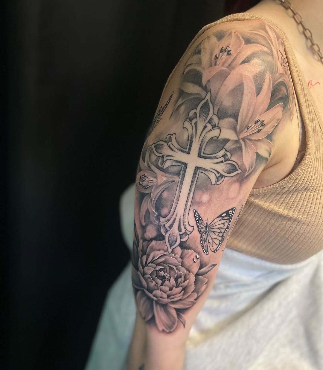 Tattoo by @tatts.by.zack — realism, black_and_grey
