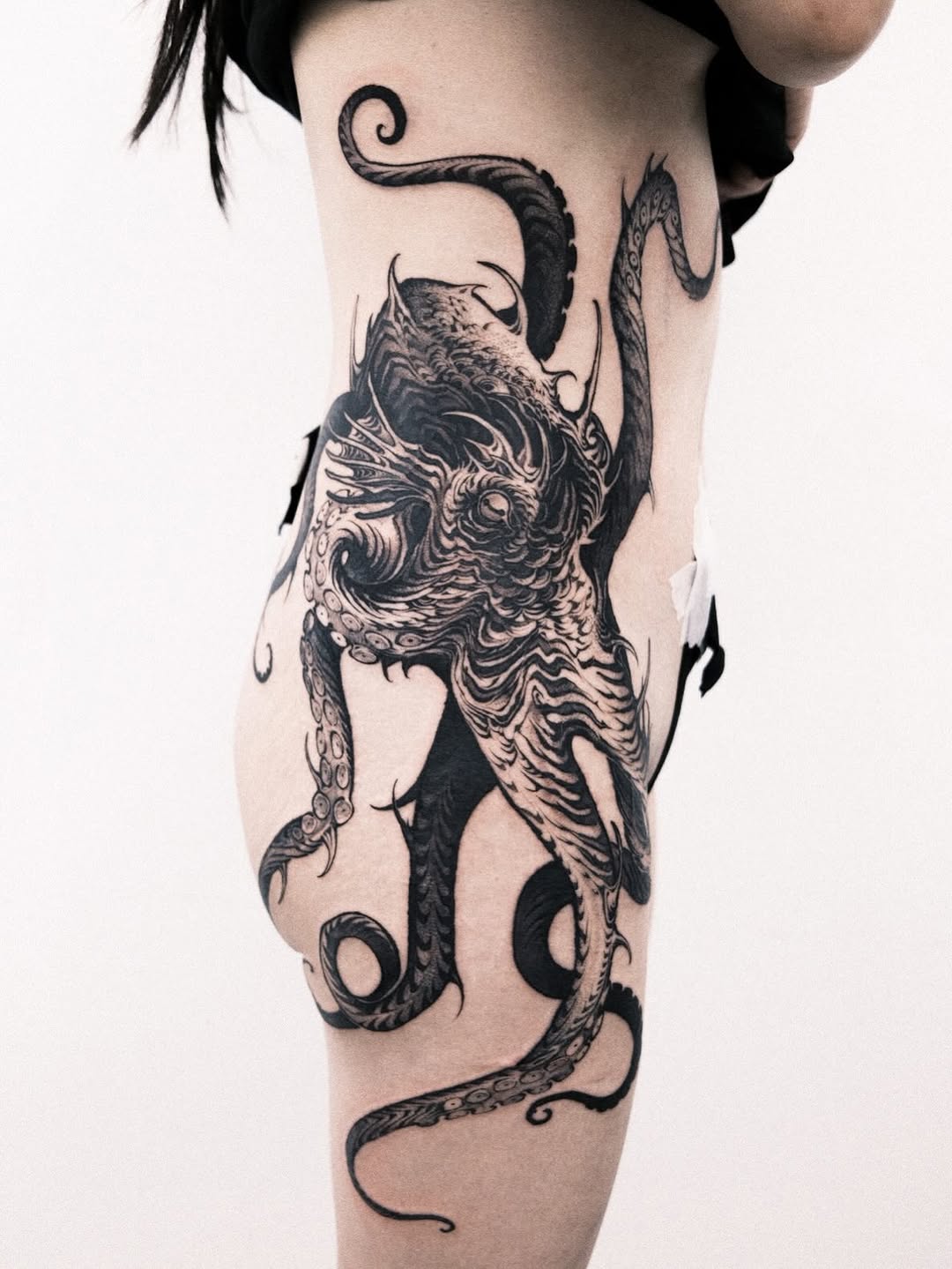 Tattoo by @wooleh__ — blackwork, dark_realism