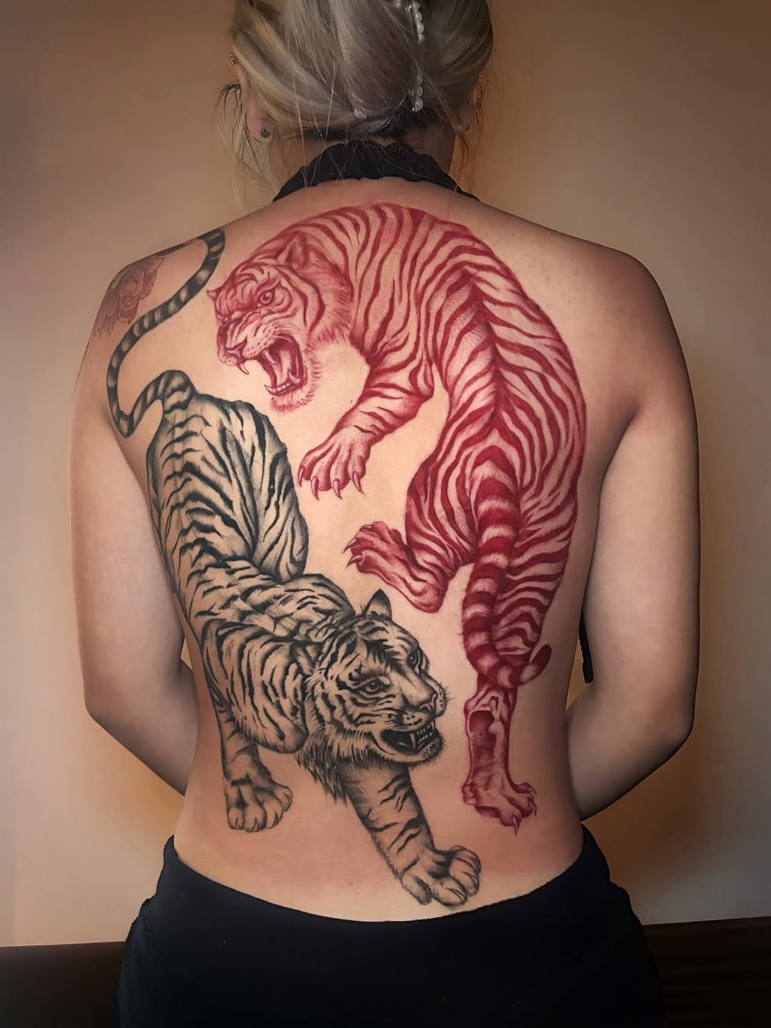 Tattoo by @liz.tattooz — black_and_grey, illustrative