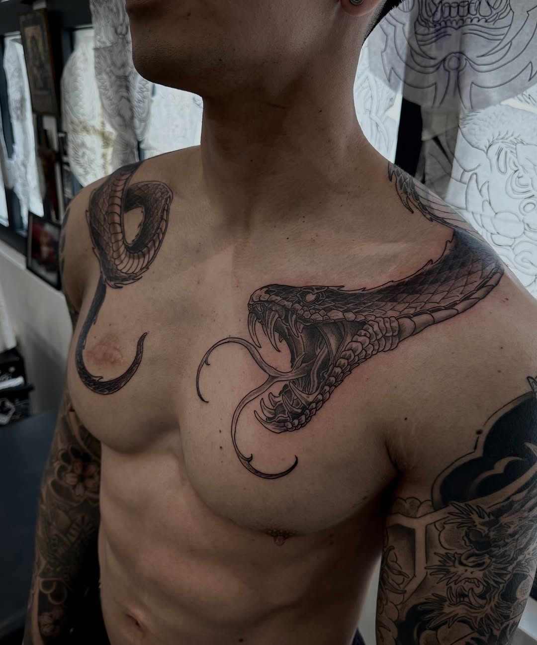 Tattoo by @tristvn_ttt โ realism, black_and_grey
