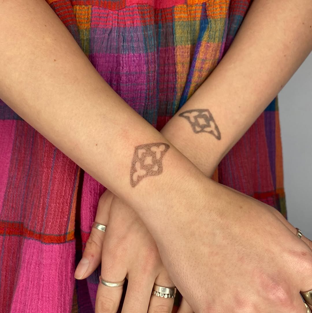 Tattoo by @hot_paws_pokes — dotwork, geometric