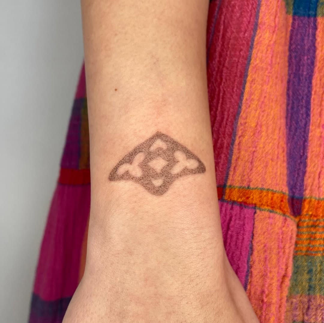 Tattoo by @hot_paws_pokes — dotwork, geometric