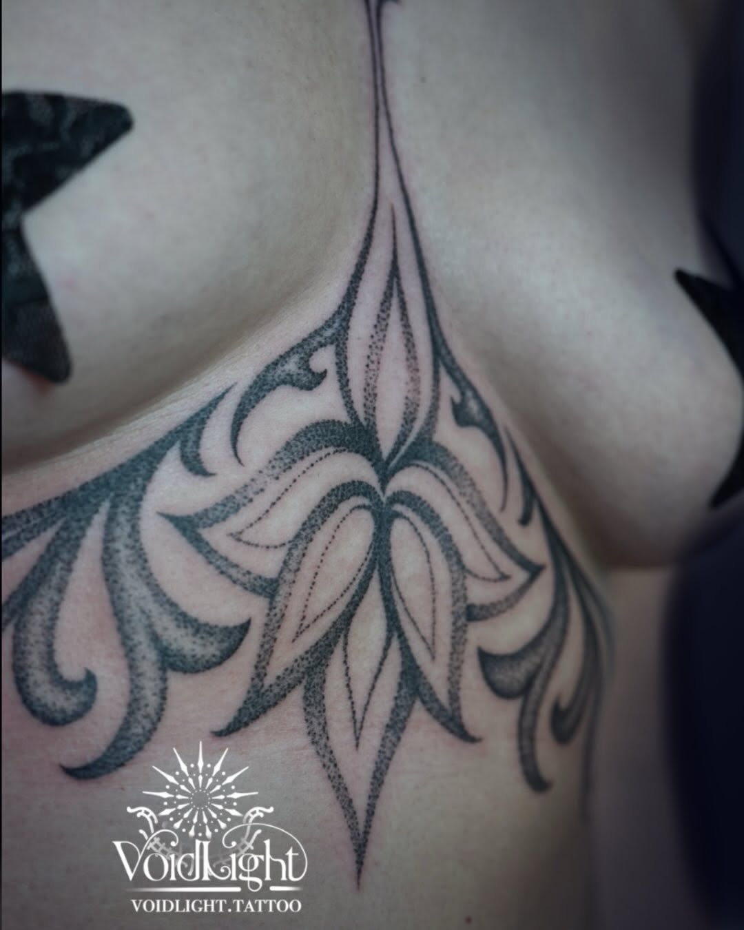 Tattoo by @voidlight.tattoo — dotwork, ornamental