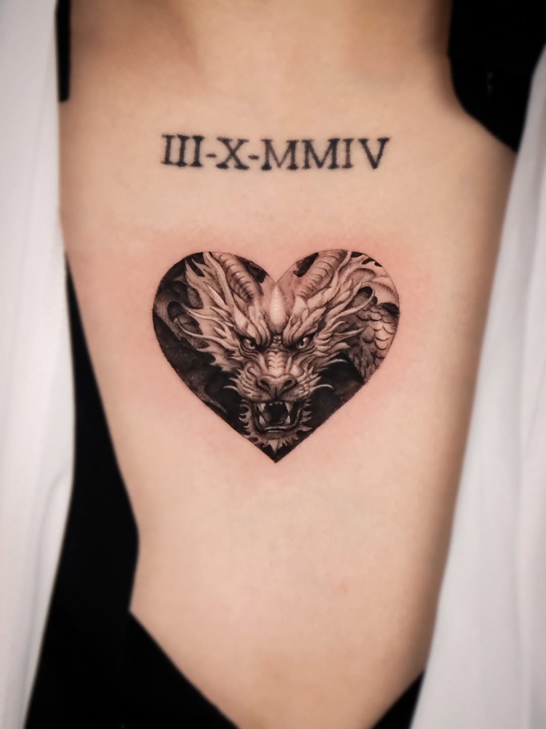 Tattoo by @da.an_tattooer — realism, black_and_grey