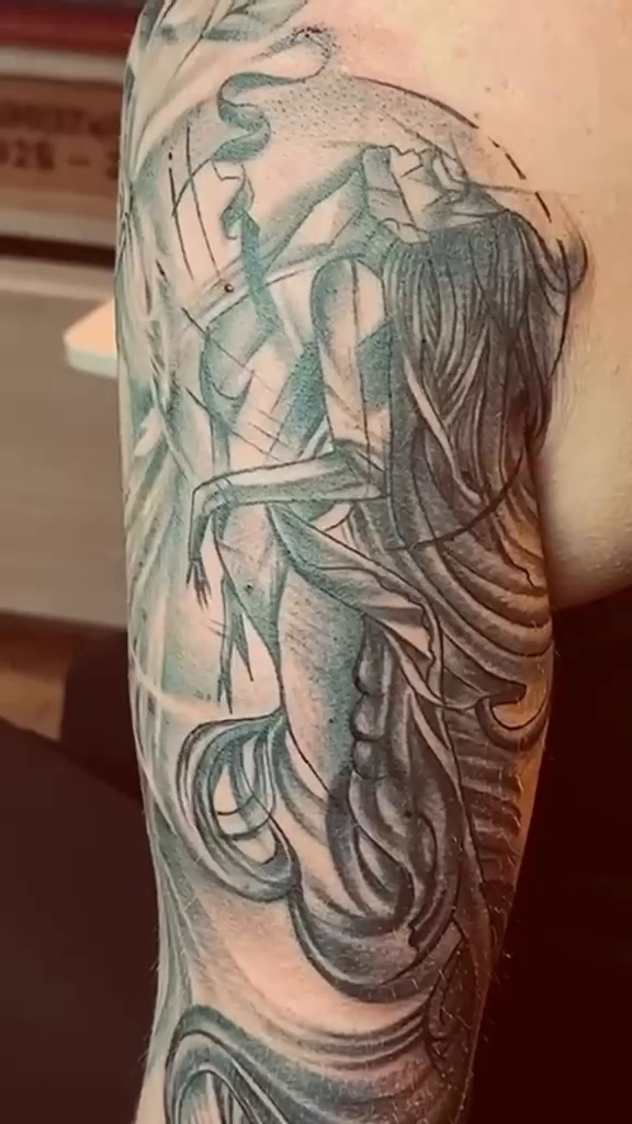 Tattoo by @tattookaren — black_and_grey, illustrative
