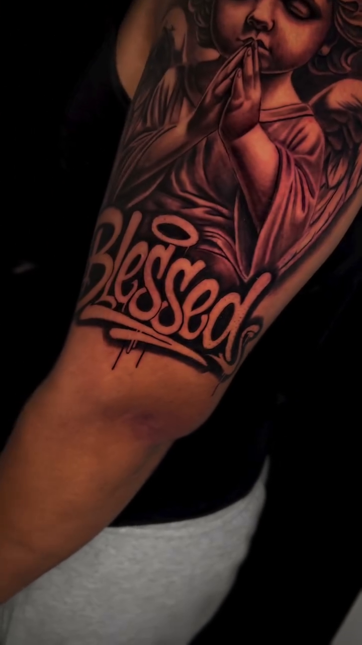 Tattoo by @tattoo_angel — black_and_grey, realism