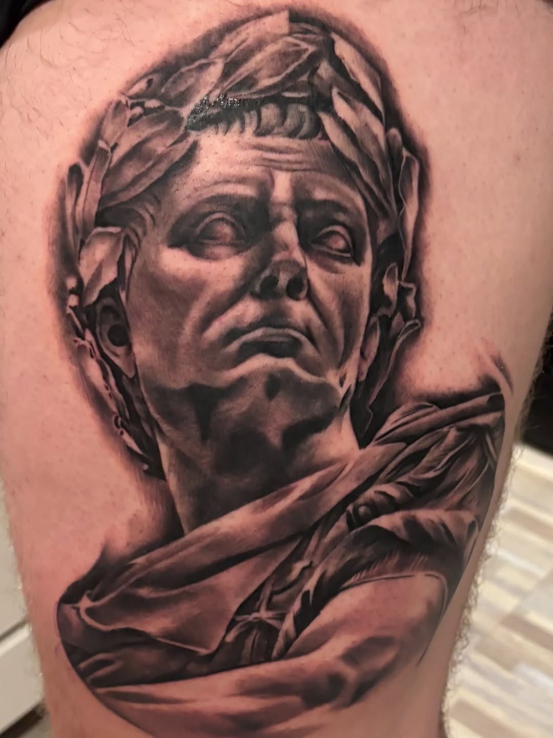 Tattoo by @tatts.by.zack — realism, black_and_grey
