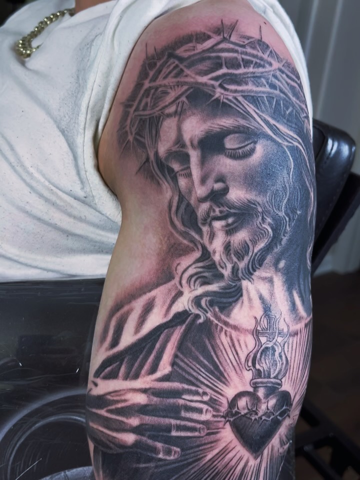 Tattoo by @carlos__macedo โ realism, black_and_grey