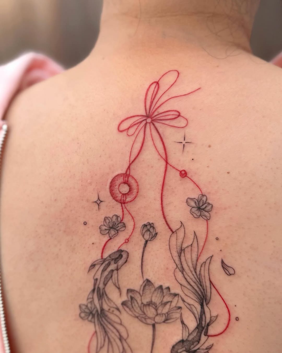 Tattoo by @nganvu.tattoo — fine_line, black_and_grey