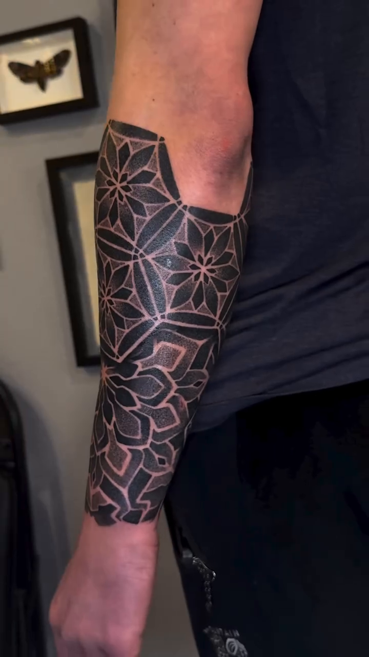 Tattoo by @danaratattoos — geometric, blackwork