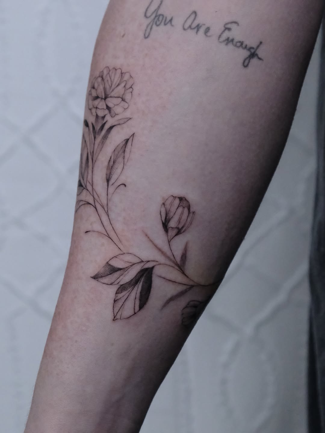 Tattoo by @apes.ttt โ fine_line, lettering_script