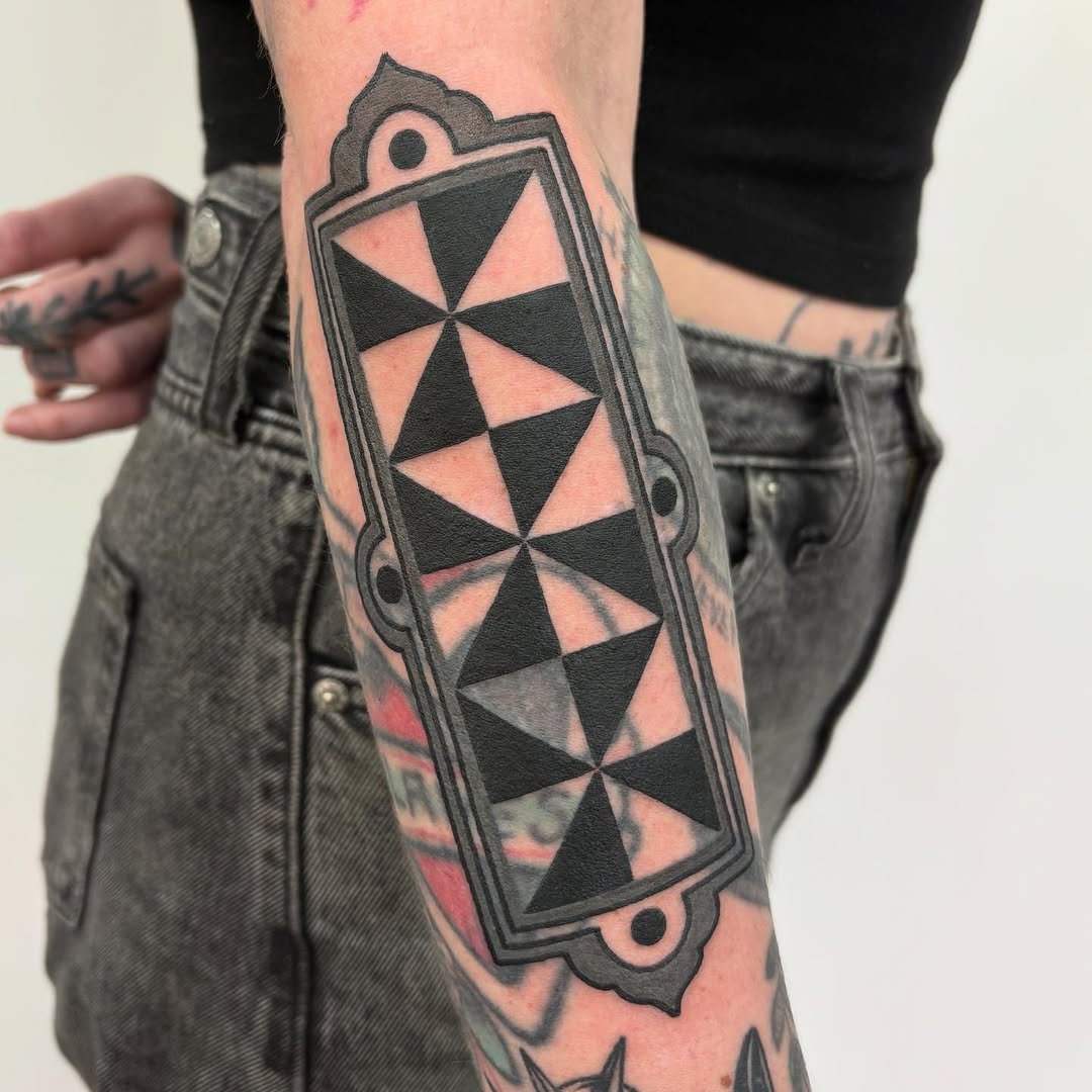 Tattoo by @slime.time.live — geometric, blackwork