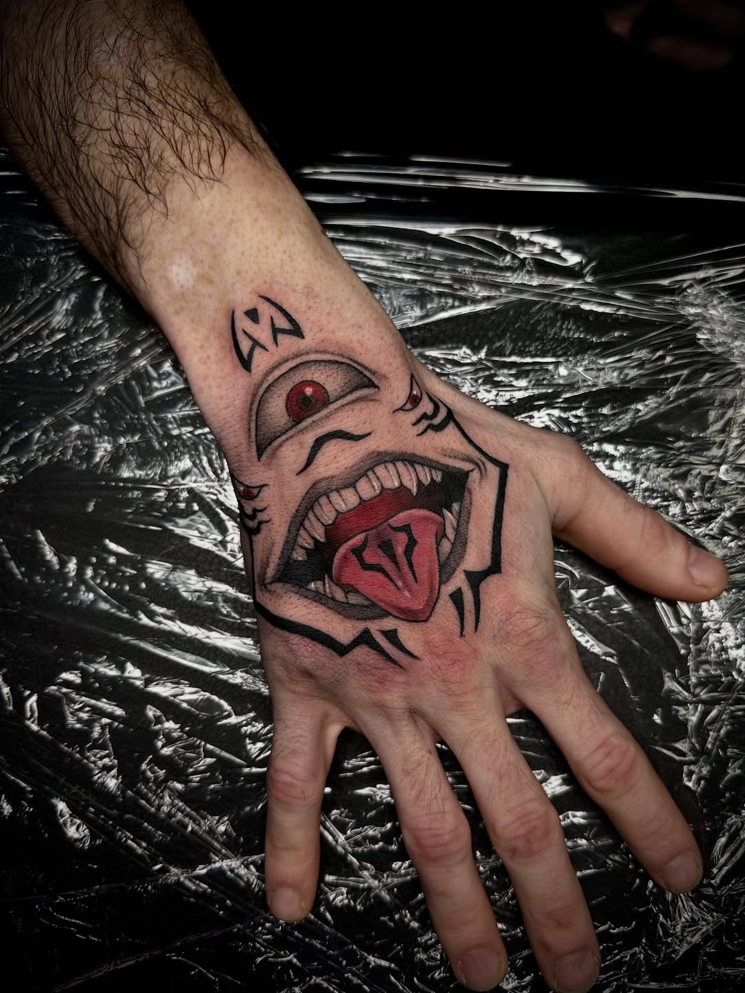 Tattoo by @madio_ink — illustrative, blackwork