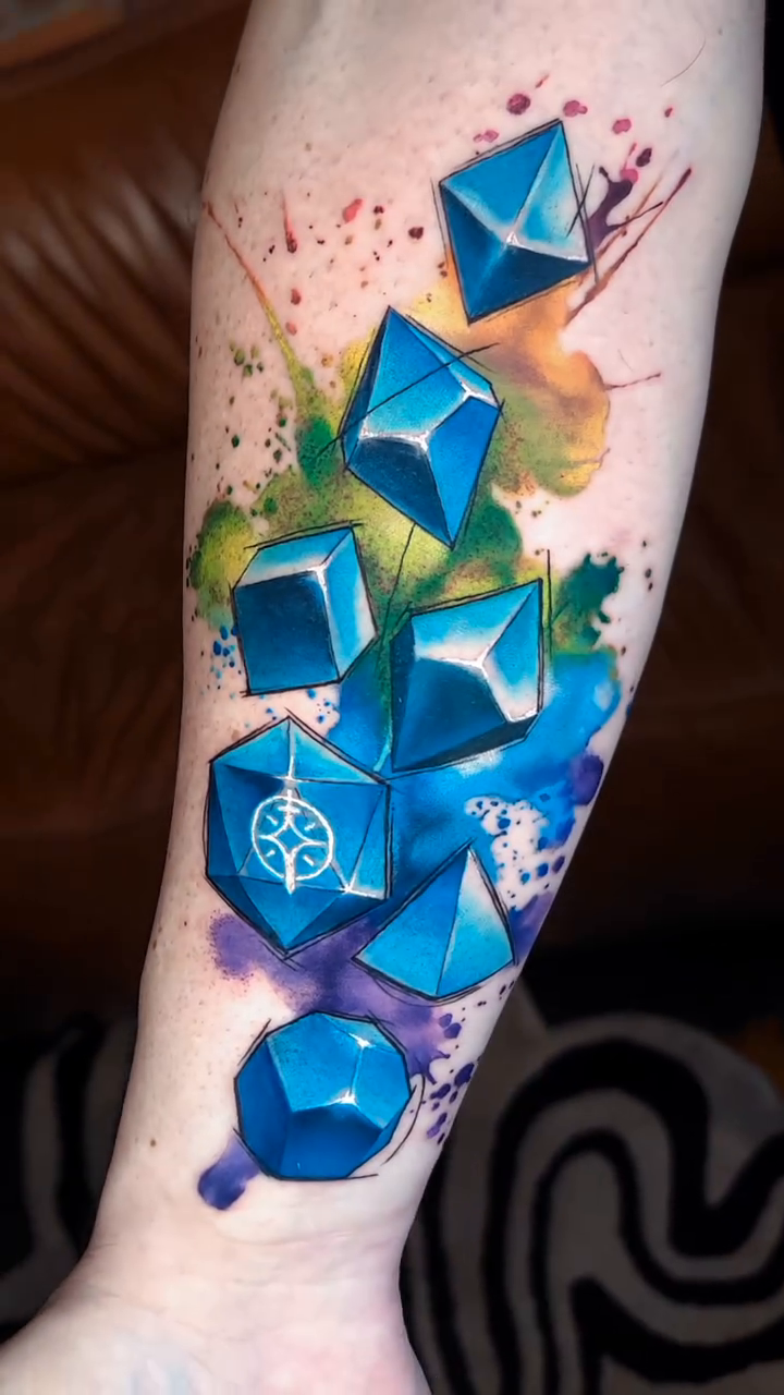 Tattoo by @banxamilli — geometric, watercolor