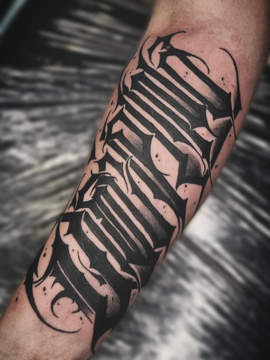 Tattoo by @antihero_tattoo — blackwork, lettering_script
