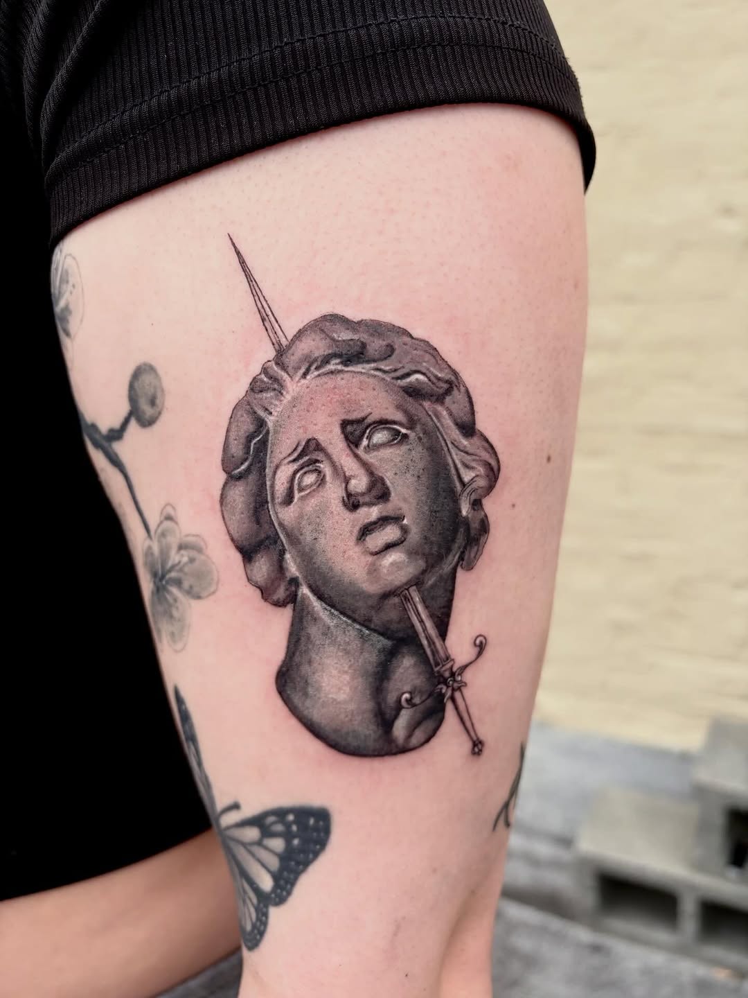 Tattoo by @tats_by_marie — realism, black_and_grey