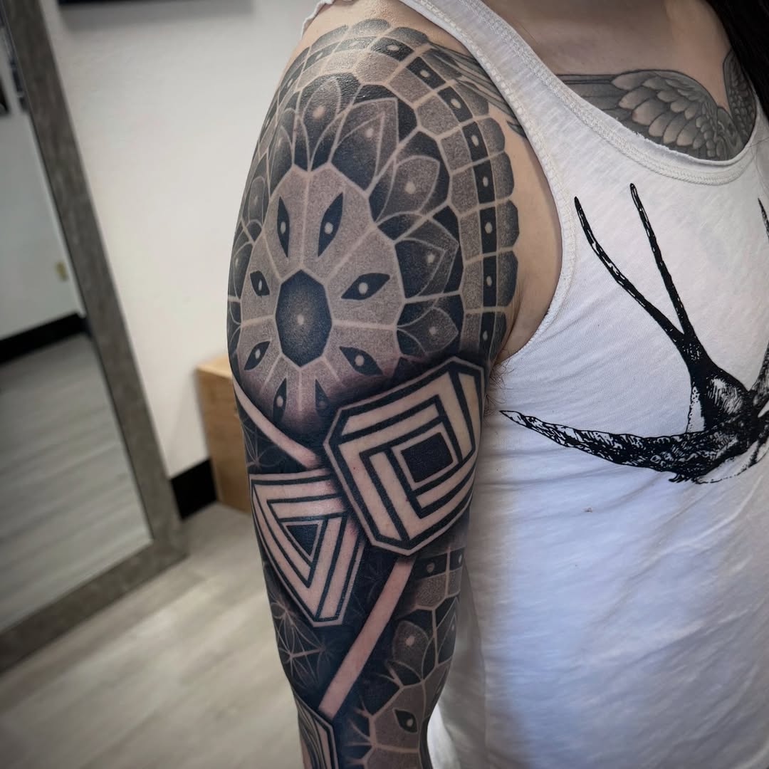 Tattoo by @jc_tats โ geometric, dotwork