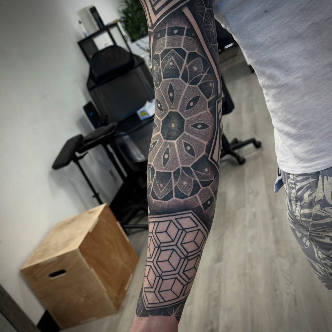 Tattoo by @jc_tats โ geometric, dotwork