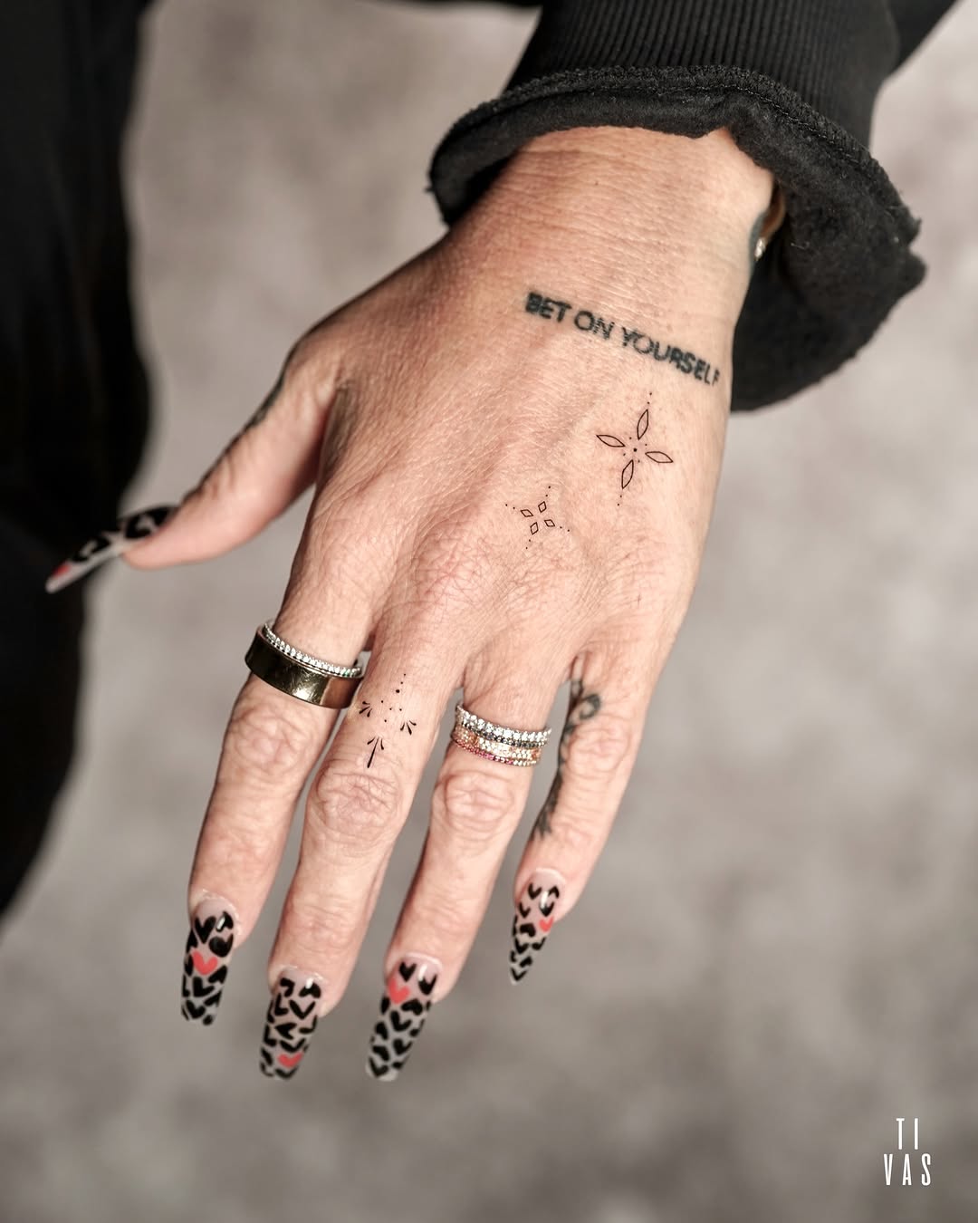 Tattoo by @tivas — lettering_script, fine_line