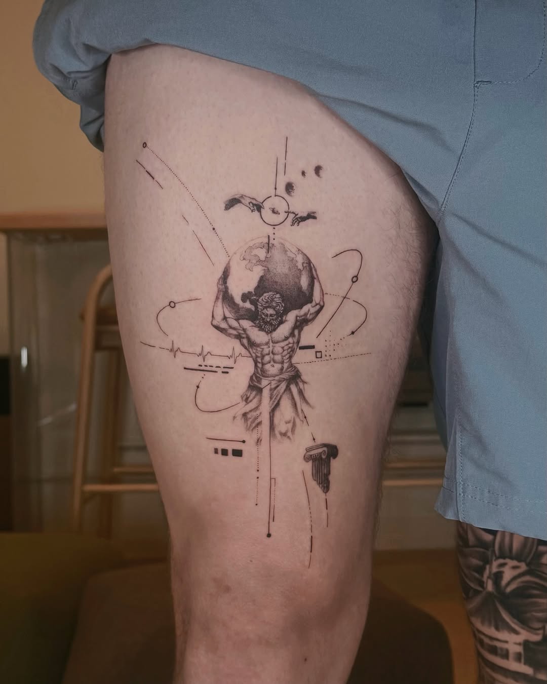 Tattoo by @iris.tatts — black_and_grey, geometric