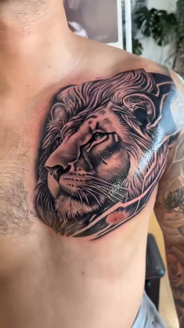 Tattoo by @rarebreedinkstudio — realism, black_and_grey