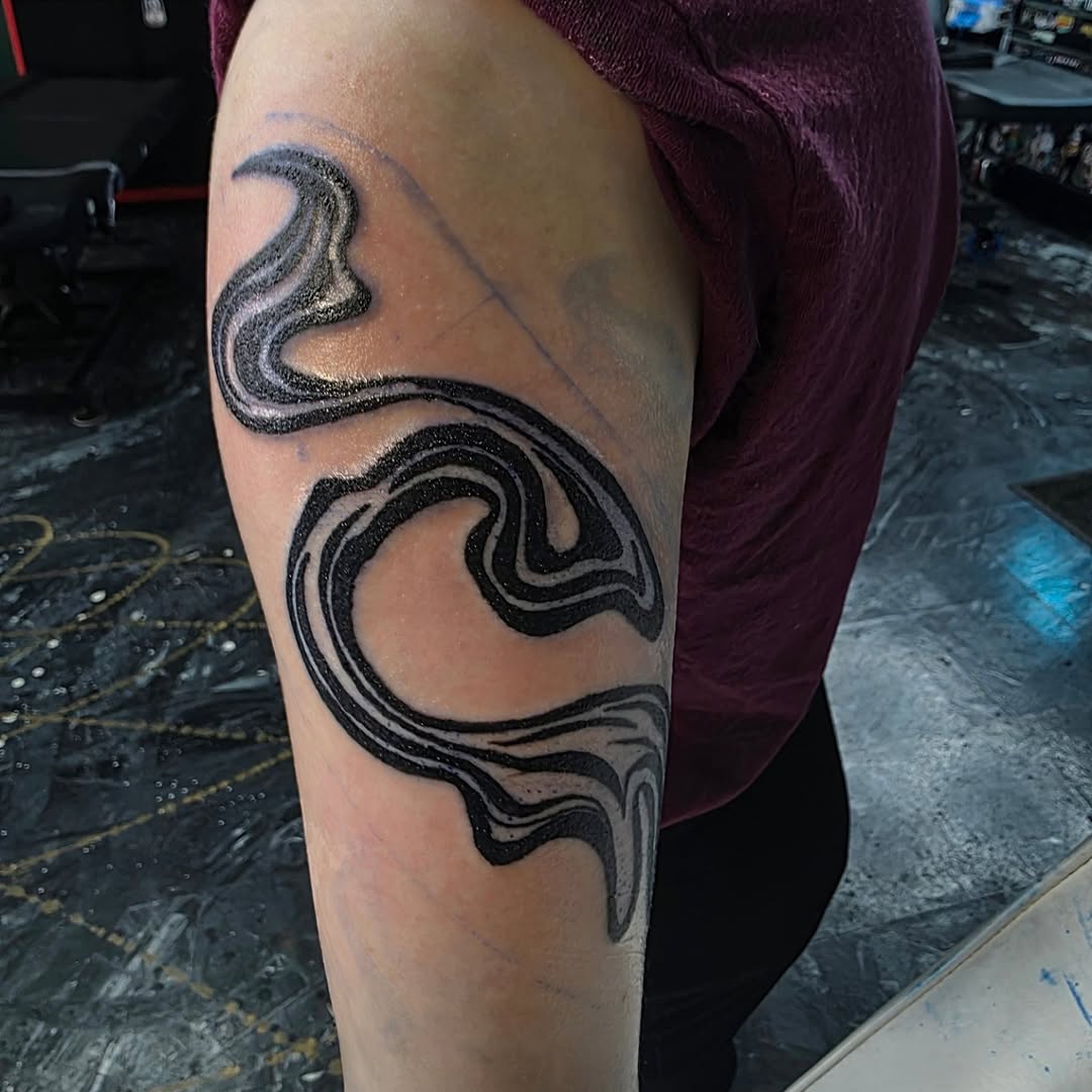 Tattoo by @bassheadtattoos — blackwork