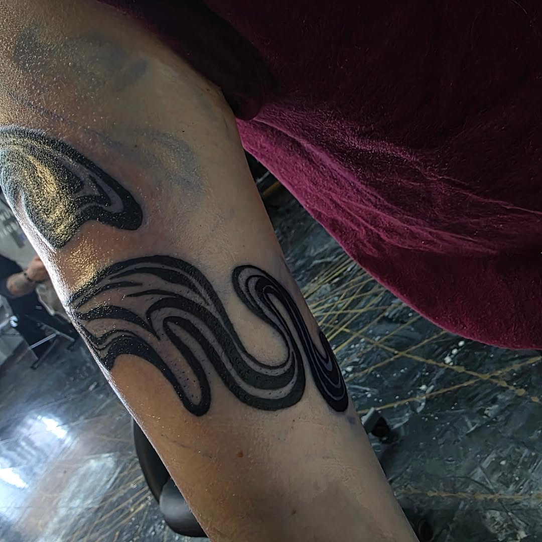 Tattoo by @bassheadtattoos — blackwork
