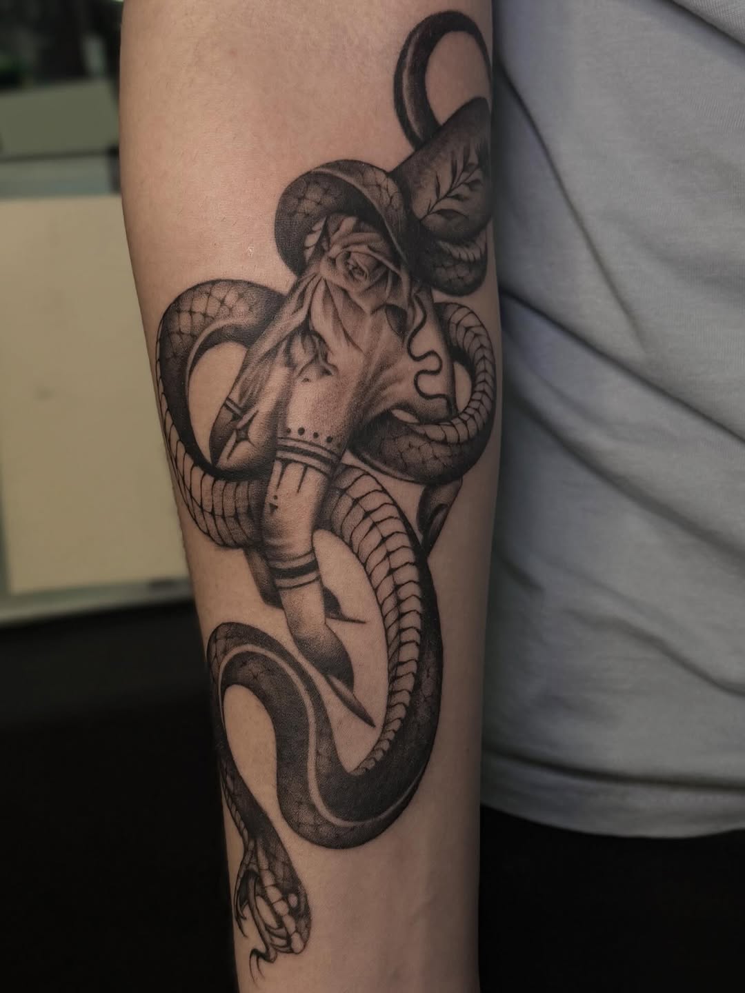 Tattoo by @brknsocialclub — black_and_grey, realism
