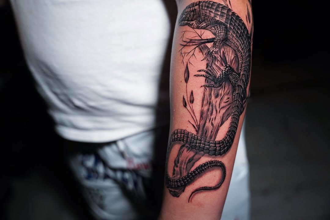 Tattoo by @elijahsdtattoos — realism, black_and_grey
