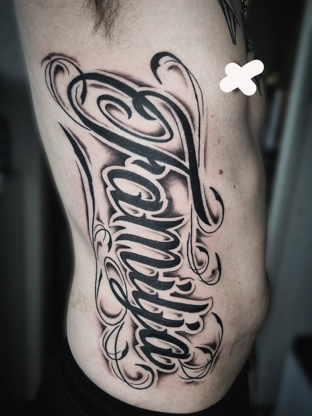 Tattoo by @antihero_tattoo — lettering_script, blackwork