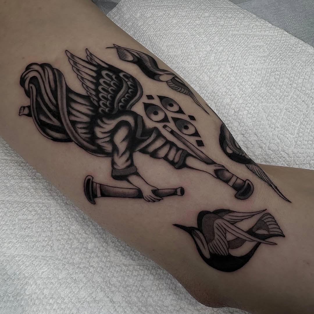 Tattoo by @evan.adtt — black_and_grey, illustrative