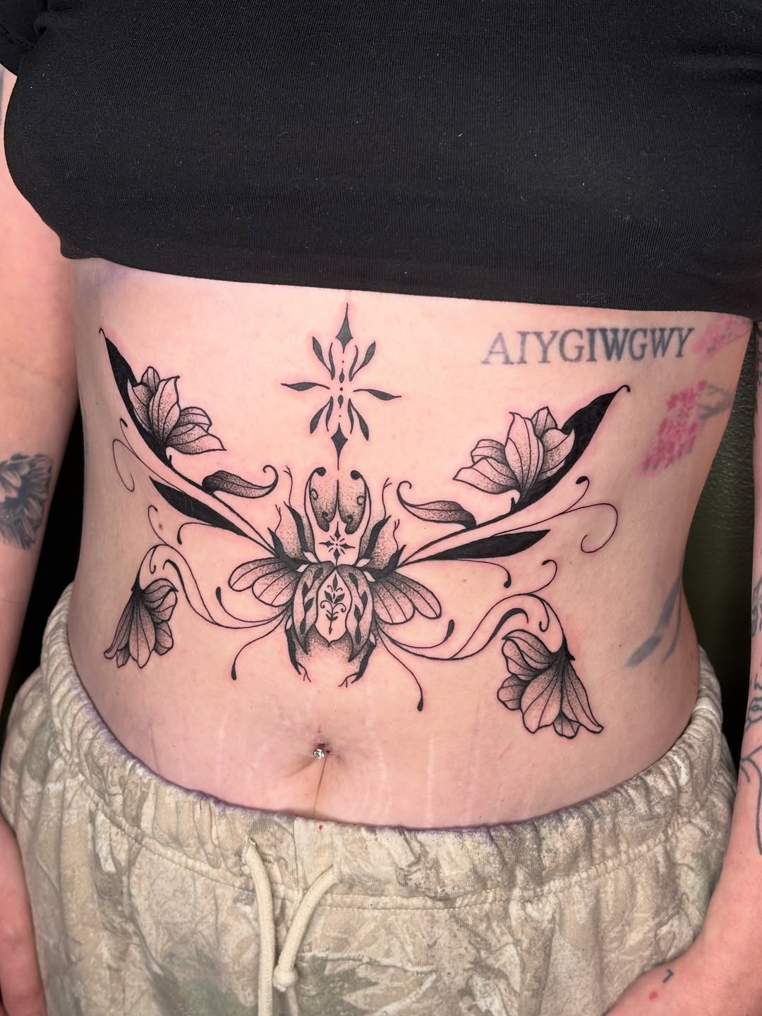 Tattoo by @kyshae.tattoos — illustrative, dotwork