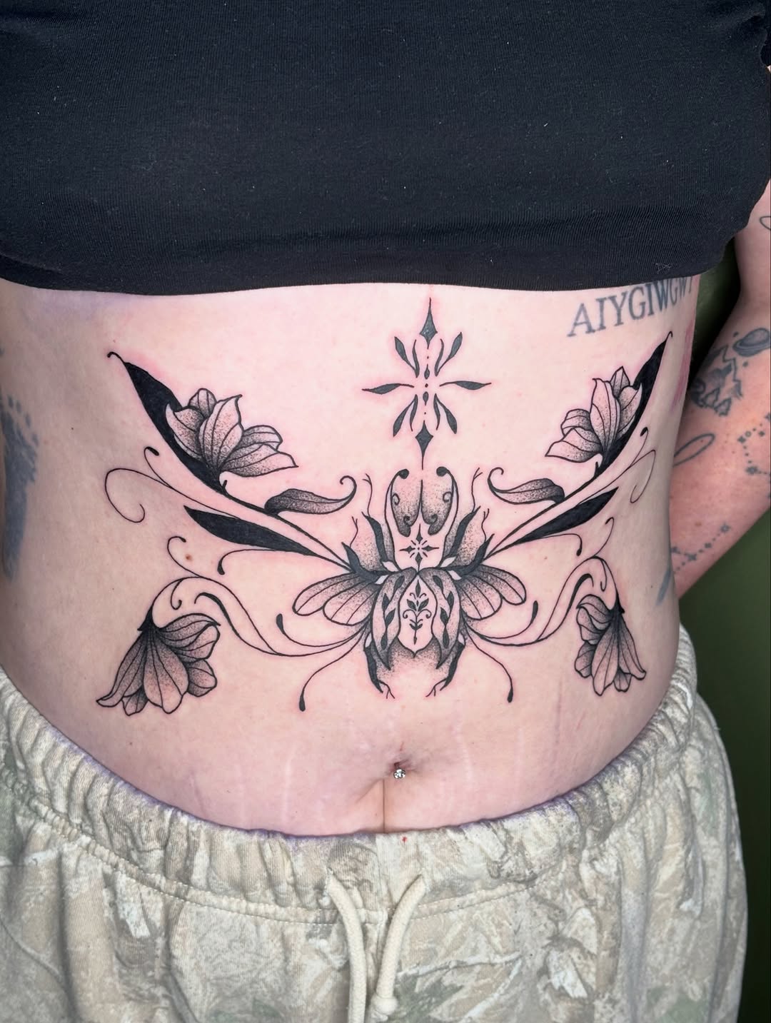 Tattoo by @kyshae.tattoos — illustrative, blackwork