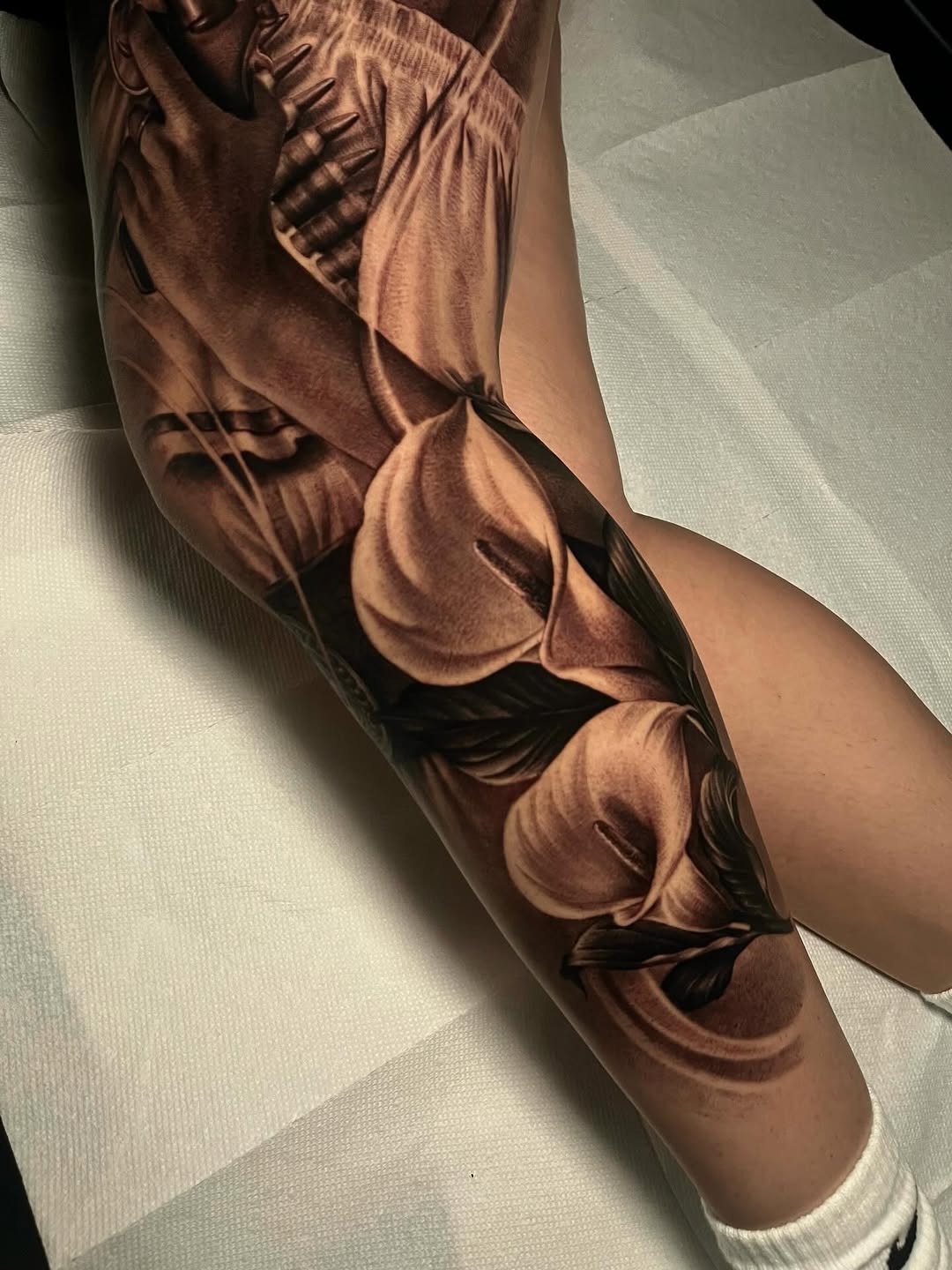Tattoo by @4biddenfruit.tattoo โ realism, black_and_grey