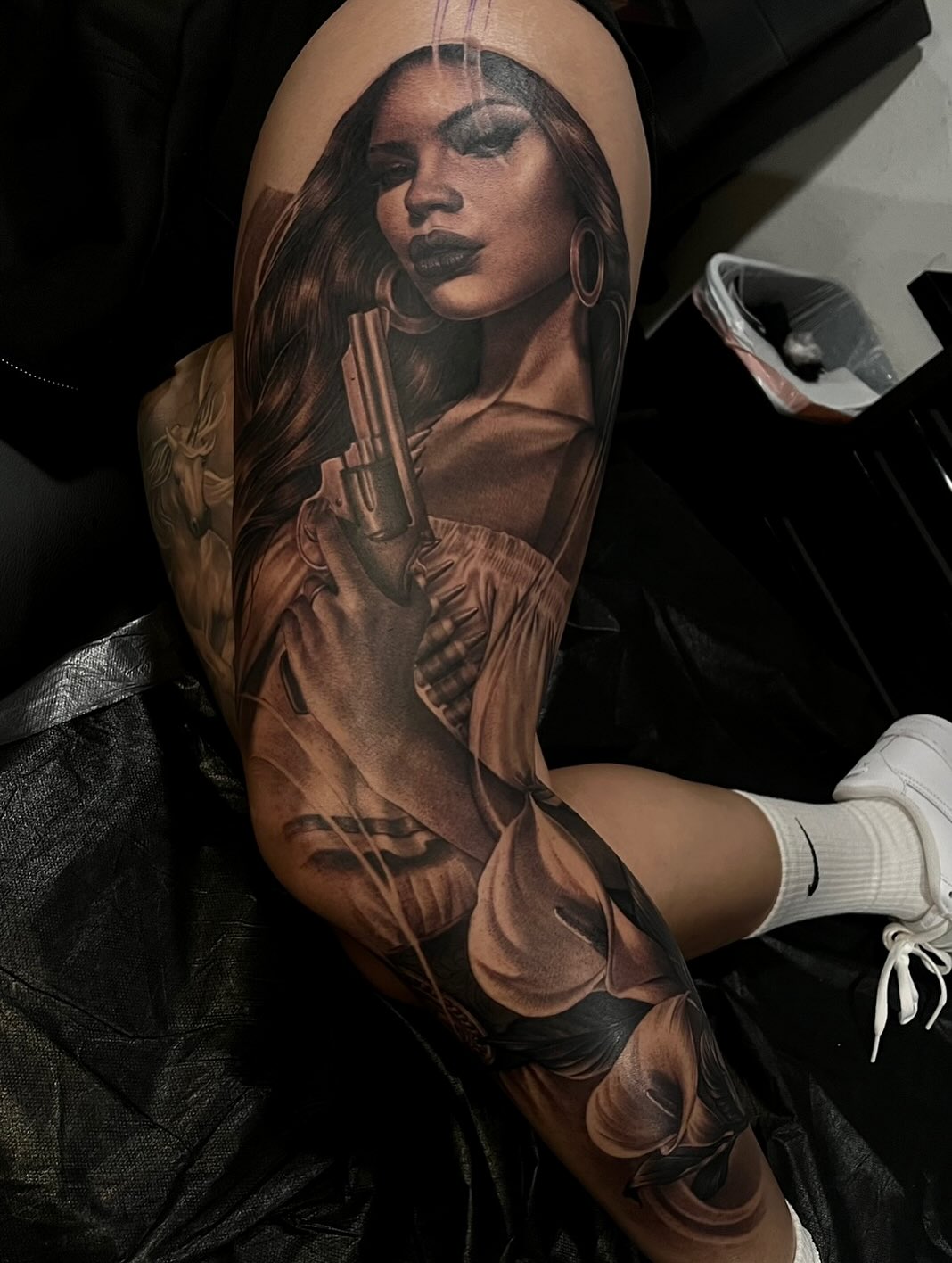 Tattoo by @4biddenfruit.tattoo โ realism, black_and_grey
