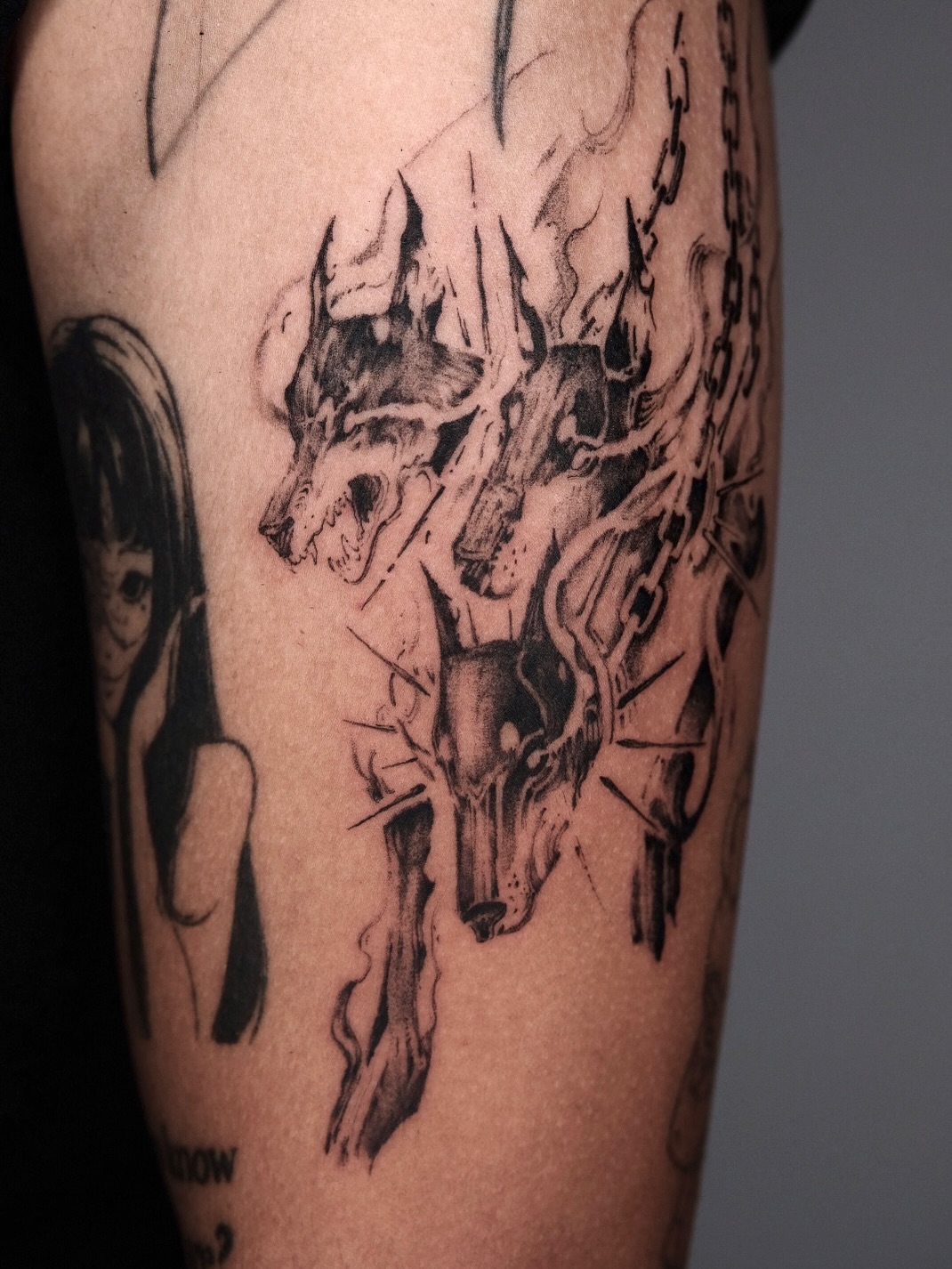 Tattoo by @rayzhu.tattoo — black_and_grey, dark_realism