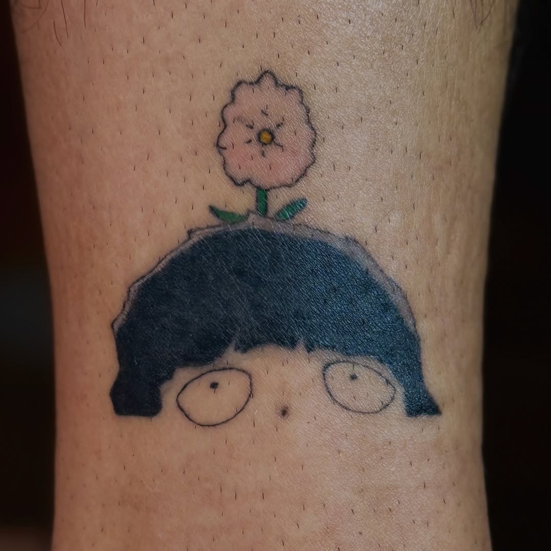 Tattoo by @eaux.tatt — anime, minimalist