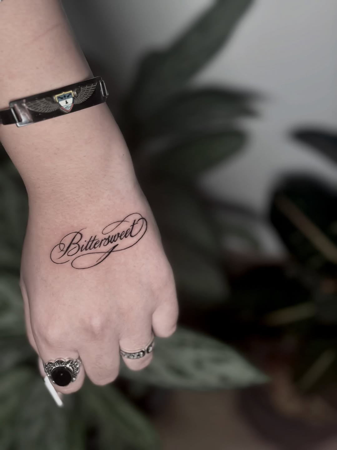 Tattoo by @deza.art — lettering_script, fine_line