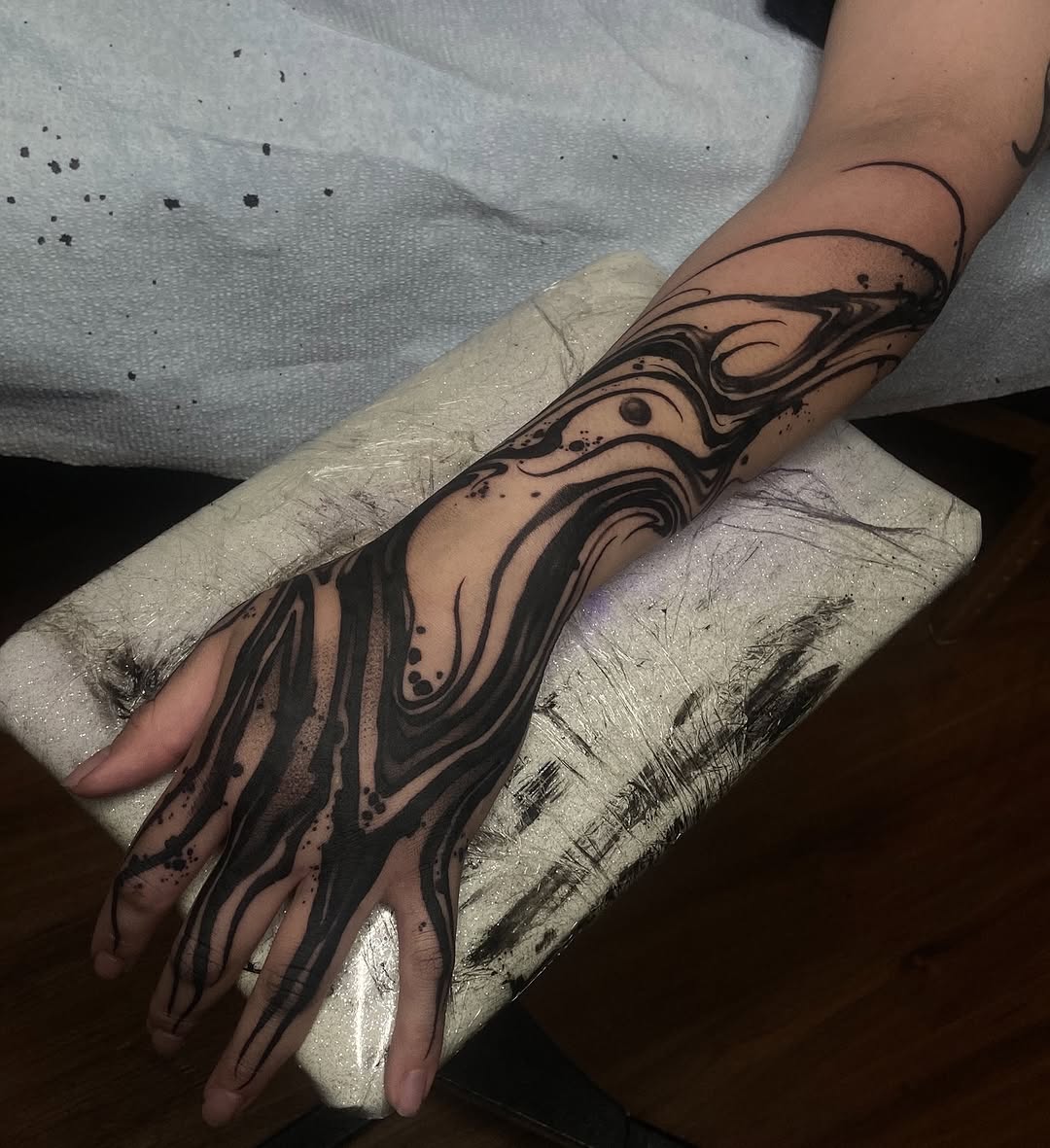 Tattoo by @baptism_black — blackwork, abstract