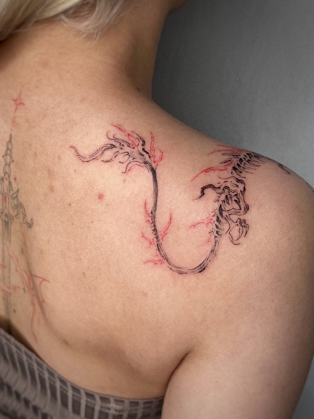 Tattoo by @rayzhu.tattoo — blackwork, fine_line