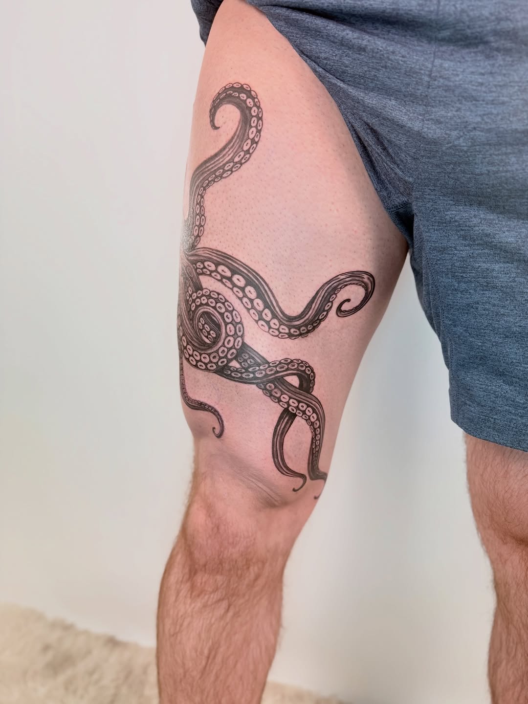 Tattoo by @yuri.tattooist — black_and_grey, illustrative