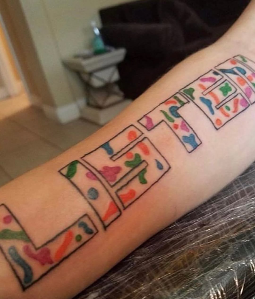 Tattoo by @oddn3n3 — lettering_script, illustrative