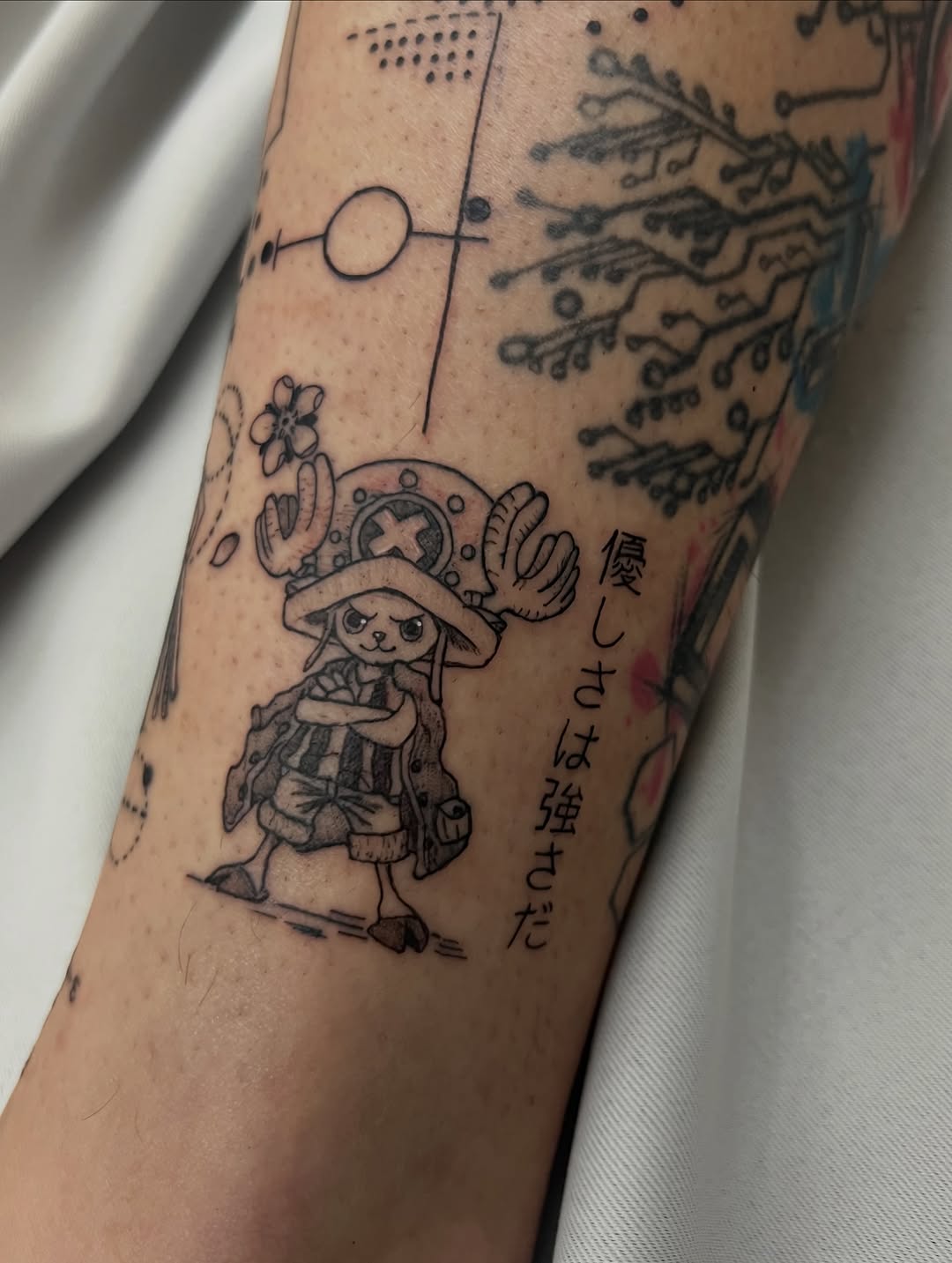 Tattoo by @azevtattoo — anime, lettering_script